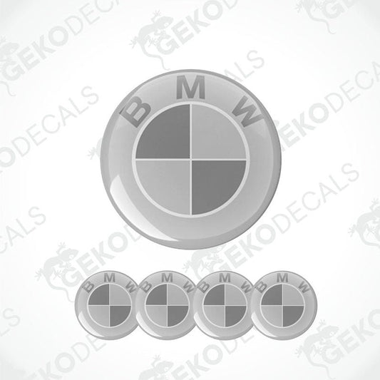 A set of four round car stickers with a gray background and a light and dark gray BMW logo.