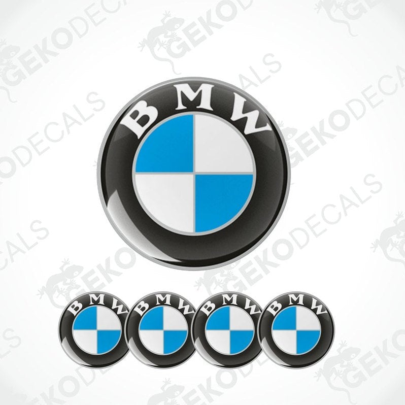 A set of four BMW branded vinyl decals with a polyurethane coating, displayed against a white background.