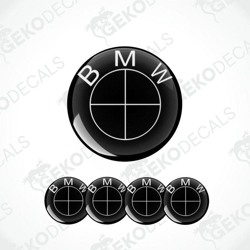 A set of four black and white BMW vinyl decals with a polyurethane coating, displayed on a white background.
