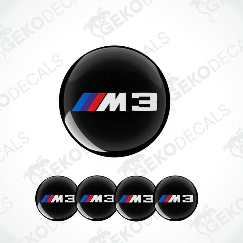 A set of four black vinyl decals with the BMW M 3 logo in center.