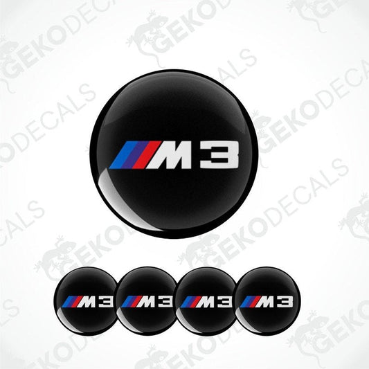 A set of four black vinyl decals with the BMW M 3 logo in center.