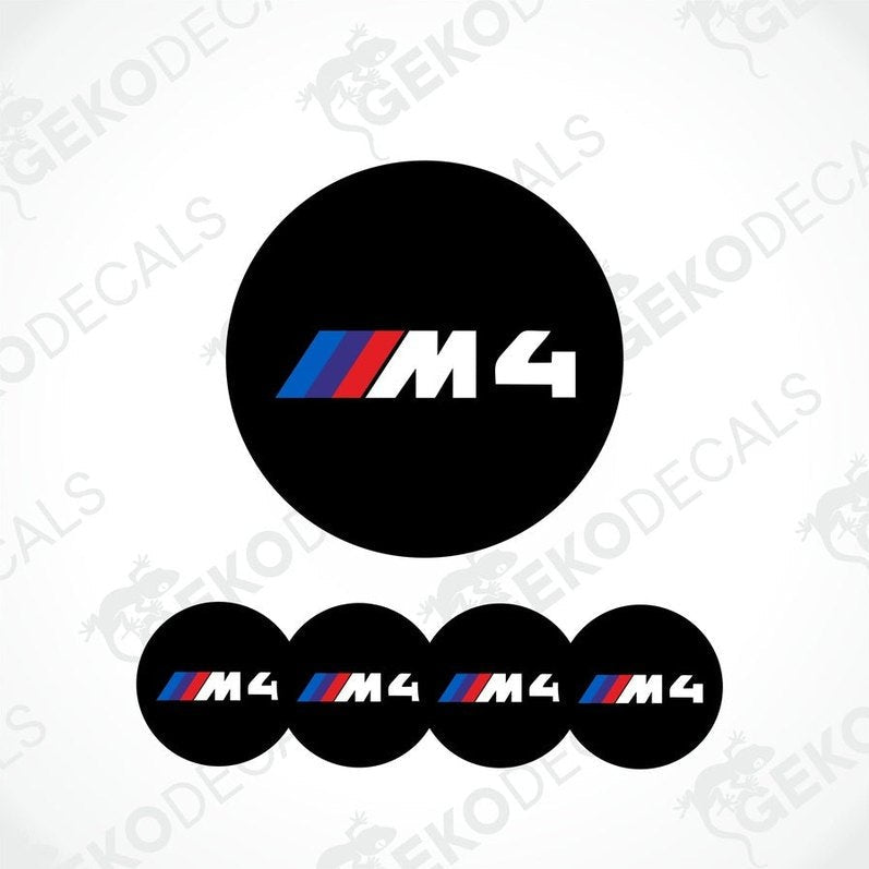 A set of four round car decals with the BMW M4 logo in black, blue, and red.