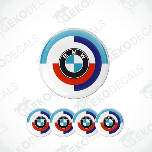A set of four vinyl stickers with a BMW motorsport theme, featuring the BMW logo and colors blue, white, and red.