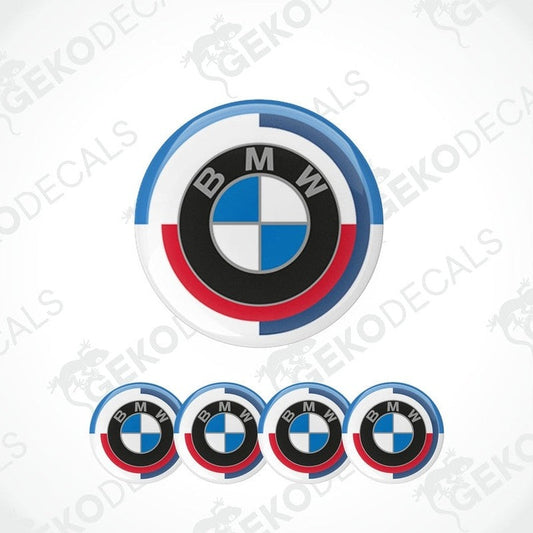 A set of four round BMW Motorsport decals with a red, white, and blue color scheme and the BMW logo in the center.
