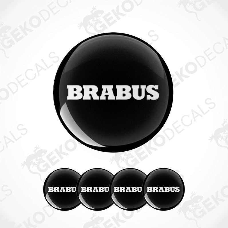 A set of four BRABUS branded vinyl decals with a black and white design.

