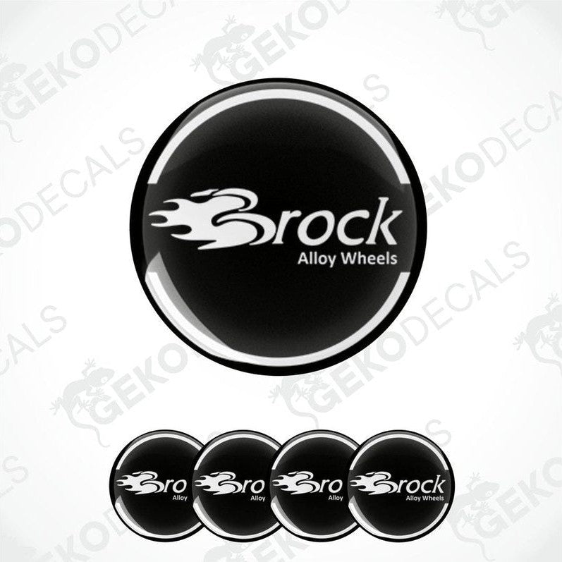 A set of four black vinyl stickers with the word 'BROCK ALLOY WHEELS' printed on them, arranged stacked on top of each other.