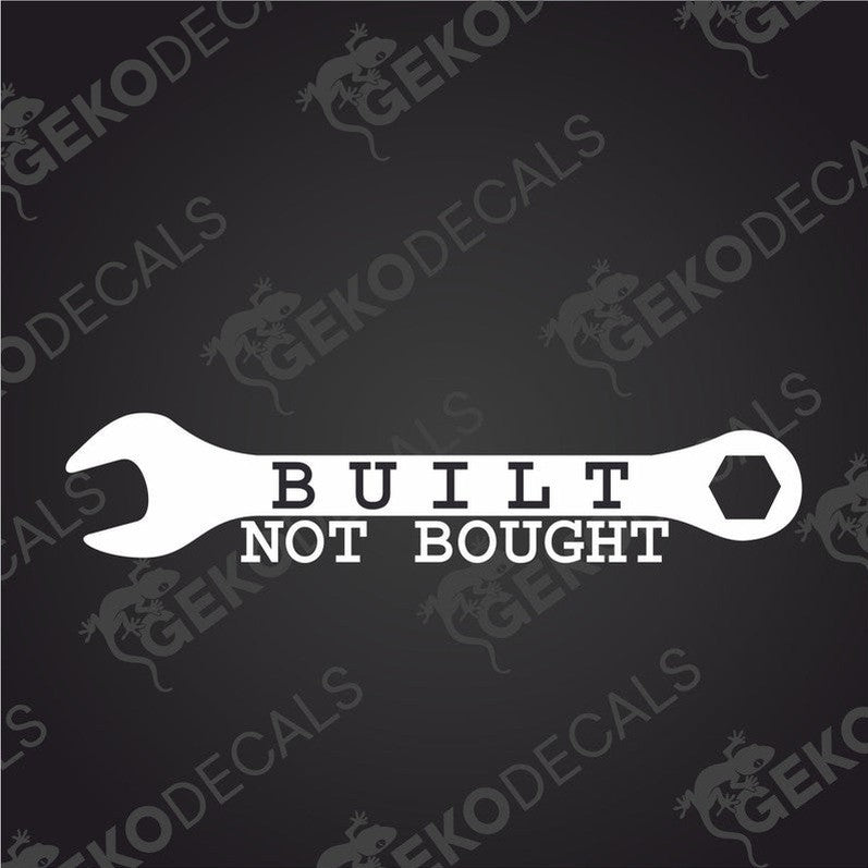 A white vinyl decal with the text 'BUILT NOT BOUGHT' and an illustration of a wrench, cut from a graphic film with no background color.