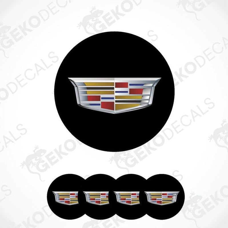 Set of four black vinyl decals with a Cadillac logo applied on them, designed for use as car wheel caps.