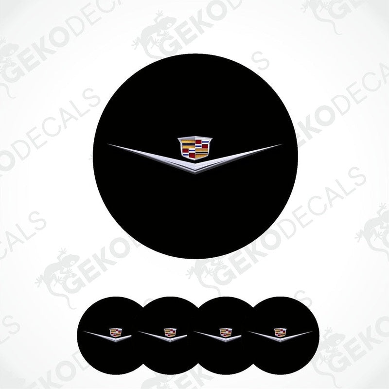 Set of four black vinyl decals with a Cadillac logo applied on them, designed for use as car wheel caps.