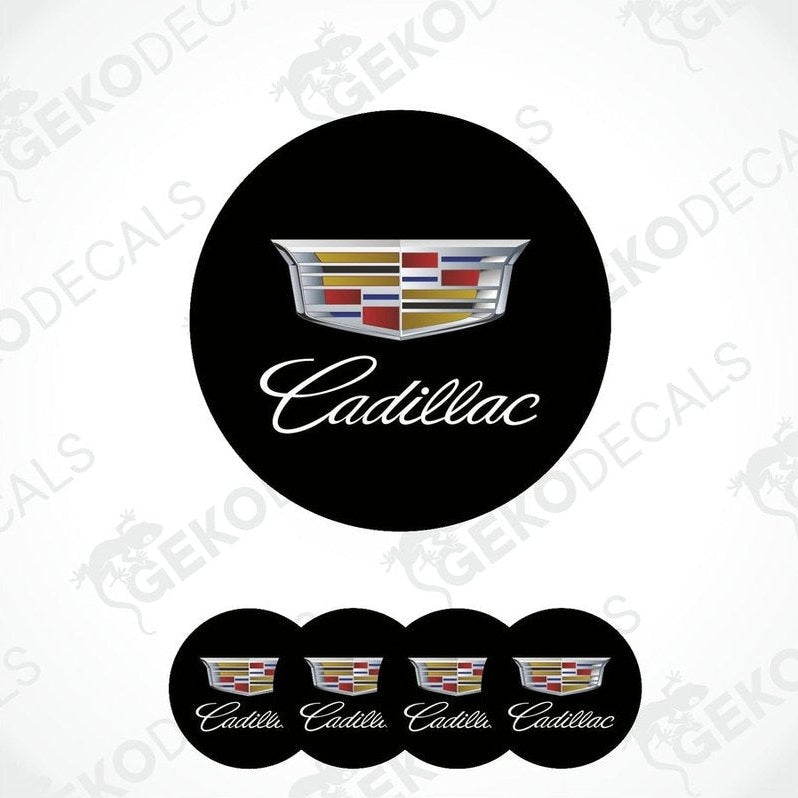 A set of four black round car decals with the Cadillac logo in the center.