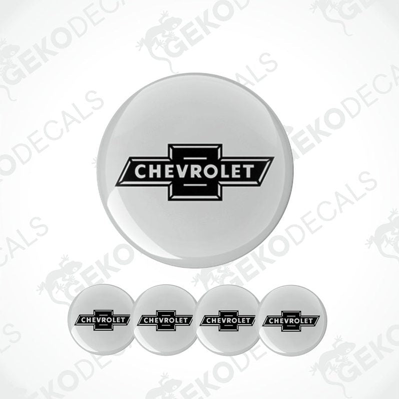 A set of four white vinyl decals with the black Chevrolet logo.