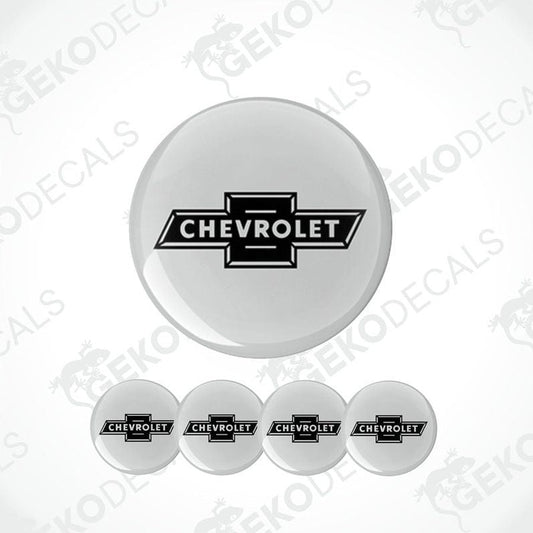 A set of four white vinyl decals with the black Chevrolet logo.
