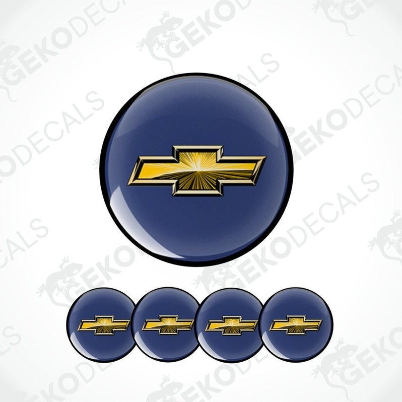 A set of four blue vinyl decals with a gold Chevrolet logo, designed for use on car wheels or caps.