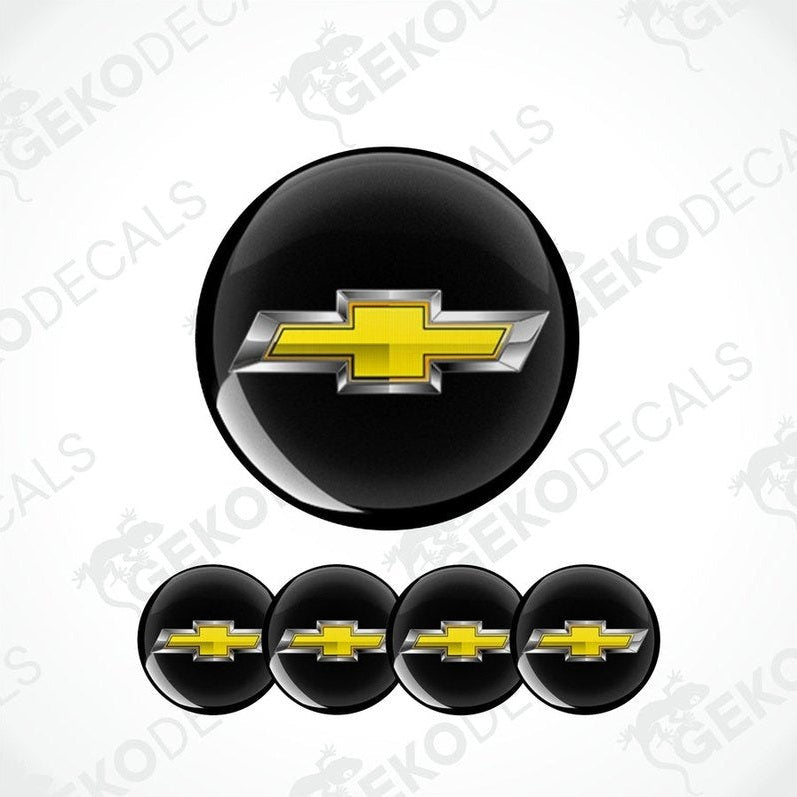 A set of four round vinyl stickers with a Chevrolet logo design, including two with a black background and two with a white background.