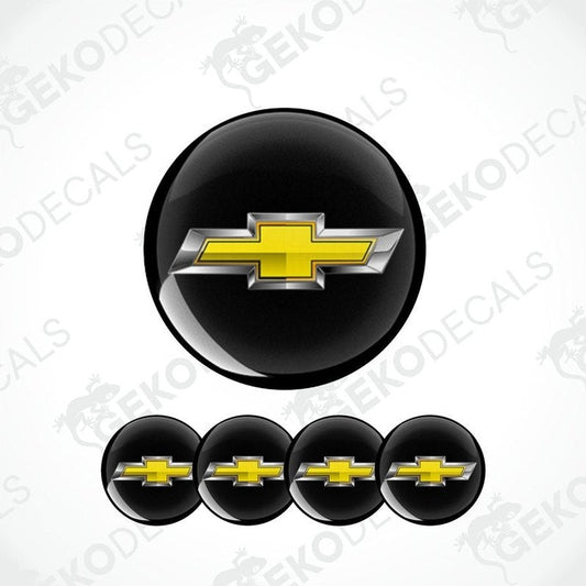 A set of four round vinyl stickers with a Chevrolet logo design, including two with a black background and two with a white background.