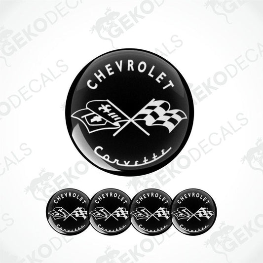 Set of vinyl decals with a polyurethane coating designed for a Chevrolet Corvette, including one large decal with the logo and three smaller ones with the logo and racing flags.