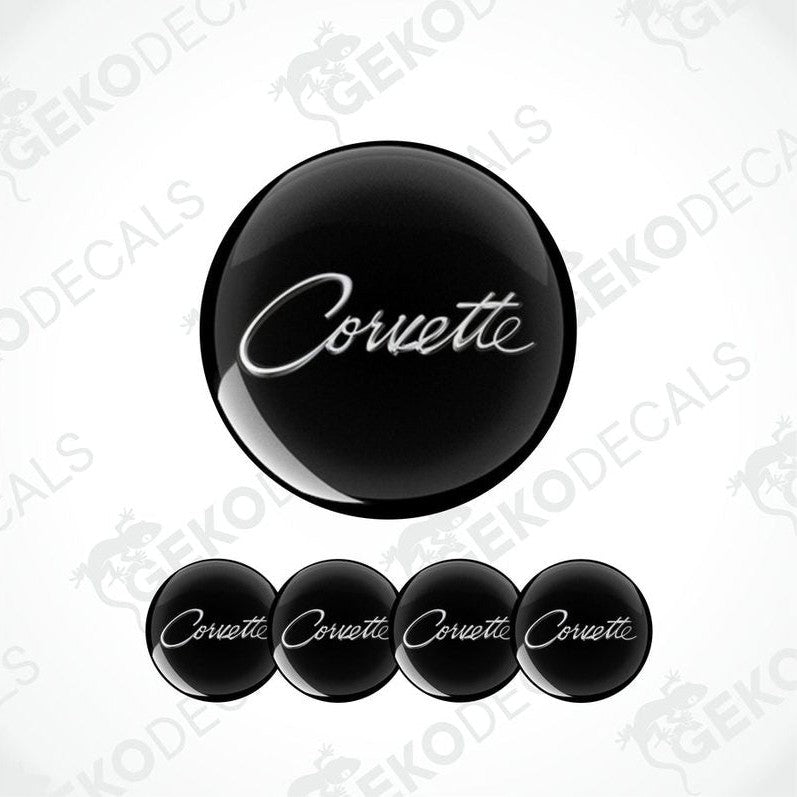 Set of four black vinyl decals with the word 'Corvette' written in white script, displayed on a white background.