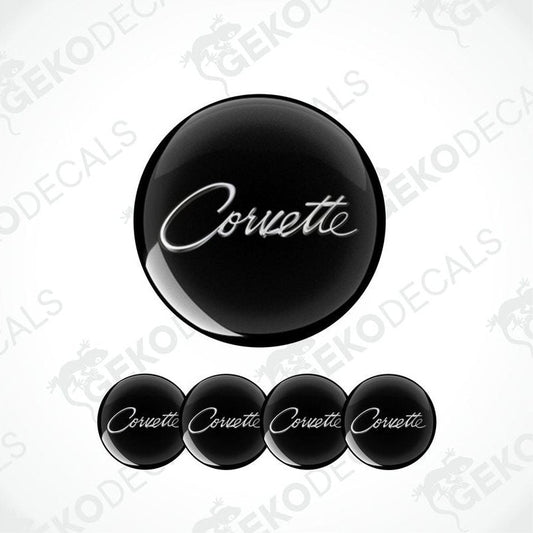 Set of four black vinyl decals with the word 'Corvette' written in white script, displayed on a white background.