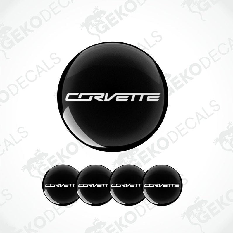 Set of four black vinyl decals with the text 'CORVETTE' on them, displayed on a white background.