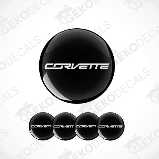 Set of four black vinyl decals with the text 'CORVETTE' on them, displayed on a white background.