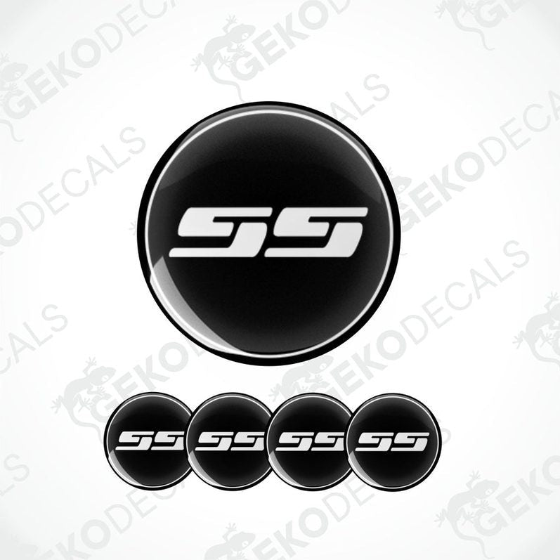 Set of four black and white vinyl decals with the CHEVROLET SS logo, designed for use on a car's wheel caps.
