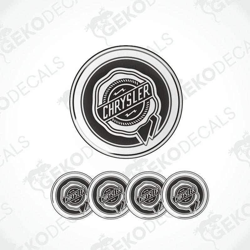 A set of black vinyl decals with the Chrysler logo, including one large decal and four smaller dome-shaped decals.