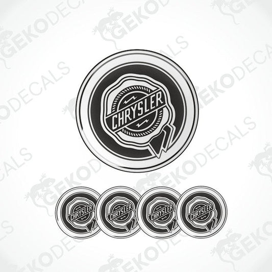 A set of black vinyl decals with the Chrysler logo, including one large decal and four smaller dome-shaped decals.