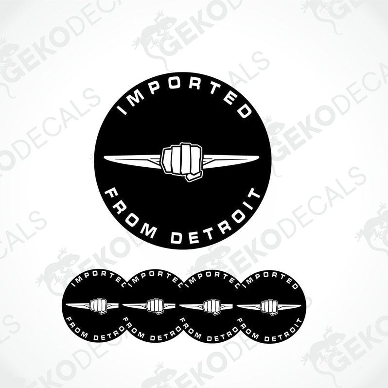 A set of black vinyl stickers with the text 'IMPORTED FROM DETROIT' and a fist graphic on them.
