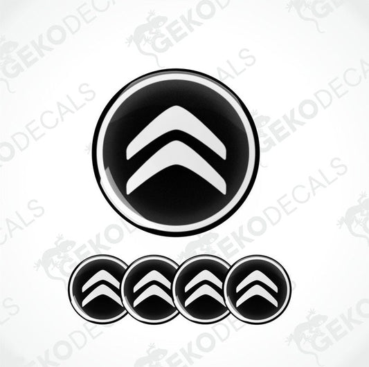 A set of four black and white vinyl decals with the CITROEN logo.