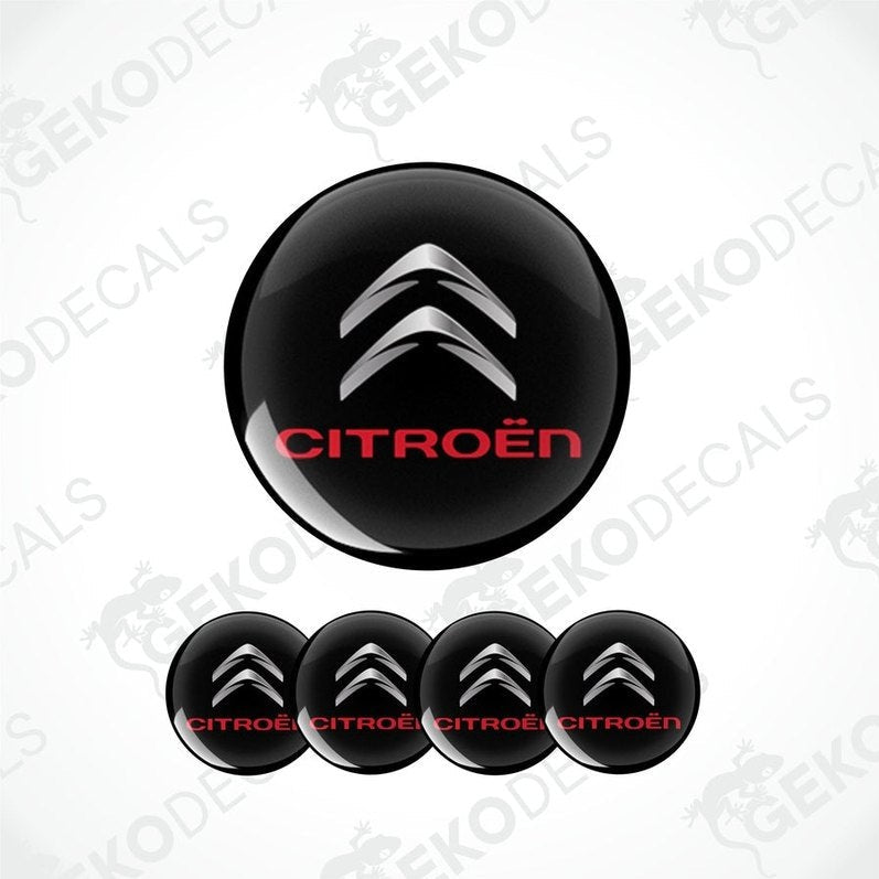 A set of black vinyl decals with the CITROEN logo in white, including four different sizes intended for use on a car.