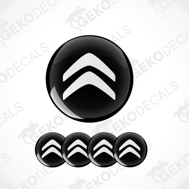 A set of four black and white vinyl decals with the CITROEN logo.
