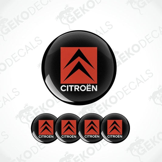 A set of four vinyl decals with polyurethane coating featuring the CITROEN logo in red and white on a black background.