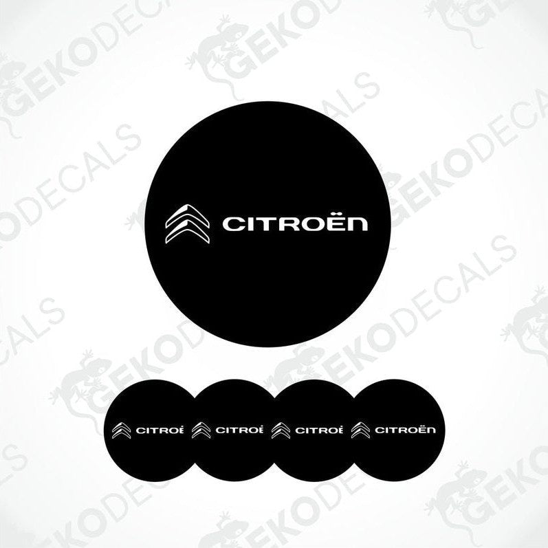 A set of four black vinyl stickers with the CITROEN brand logo on them.