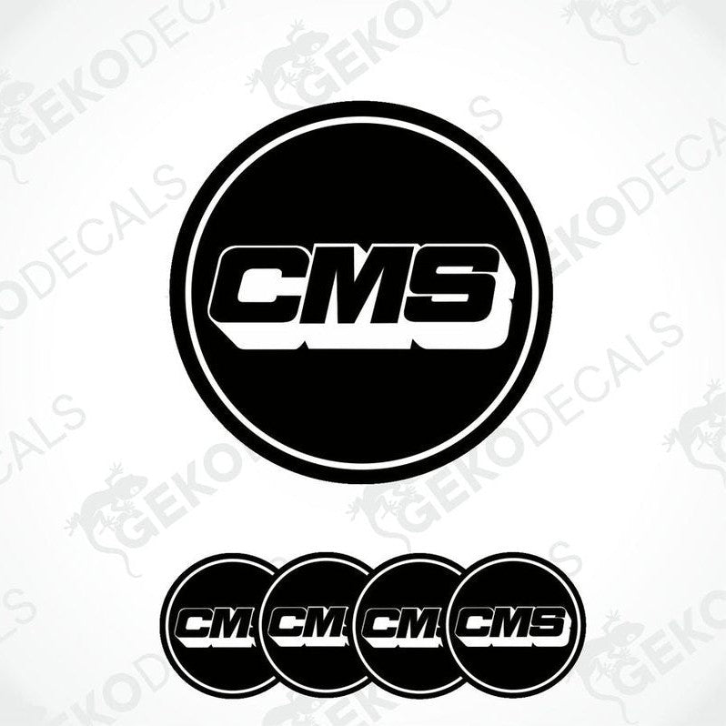 A set of four black round vinyl stickers with the CMS logo in white.