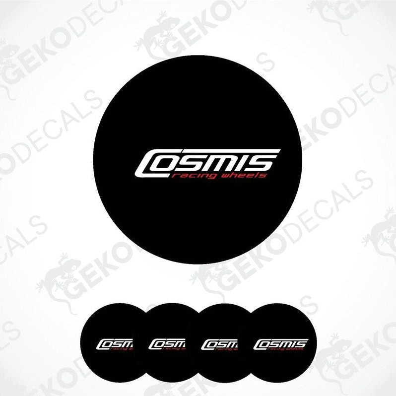 A set of four black vinyl decals with the text 'COSMIS' on them, displayed in a dome shape.