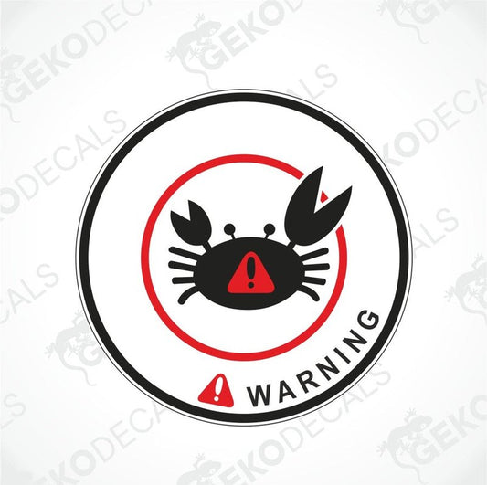 A black and red sticker with a graphic of a crab and the text 'WARNING' on it.