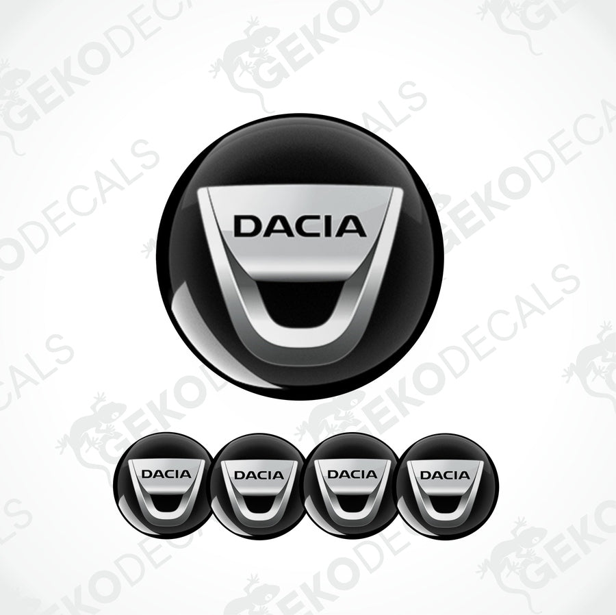 A set of four black vinyl stickers with the word 'DACIA' branded on them, designed for use as car decals.
