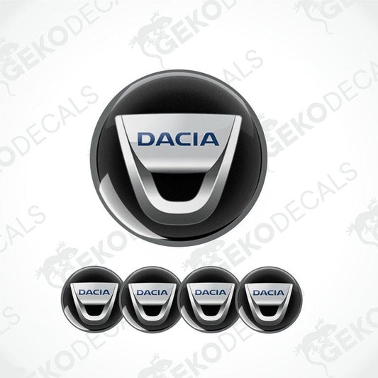 A set of four DACIA branded vinyl stickers for car wheels, displayed on a white background.