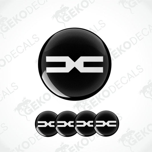 A set of black vinyl decals with the DACIA logo displayed in a prominent central position and additional smaller decals arranged below.