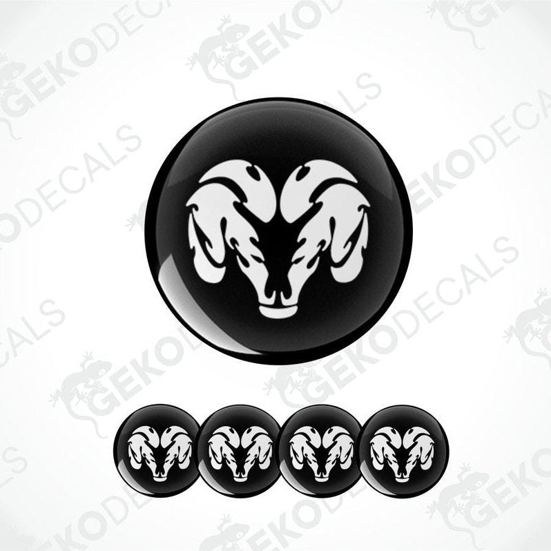 A set of black vinyl decals with a white DODGE ram's head design, intended for use as car wheel decals.