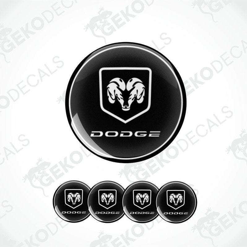 A set of black vinyl decals with a white DODGE ram's head design, intended for use as car wheel decals.