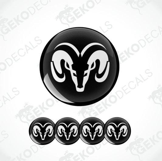 A set of black vinyl decals with a white DODGE ram's head design, intended for use as car wheel decals.