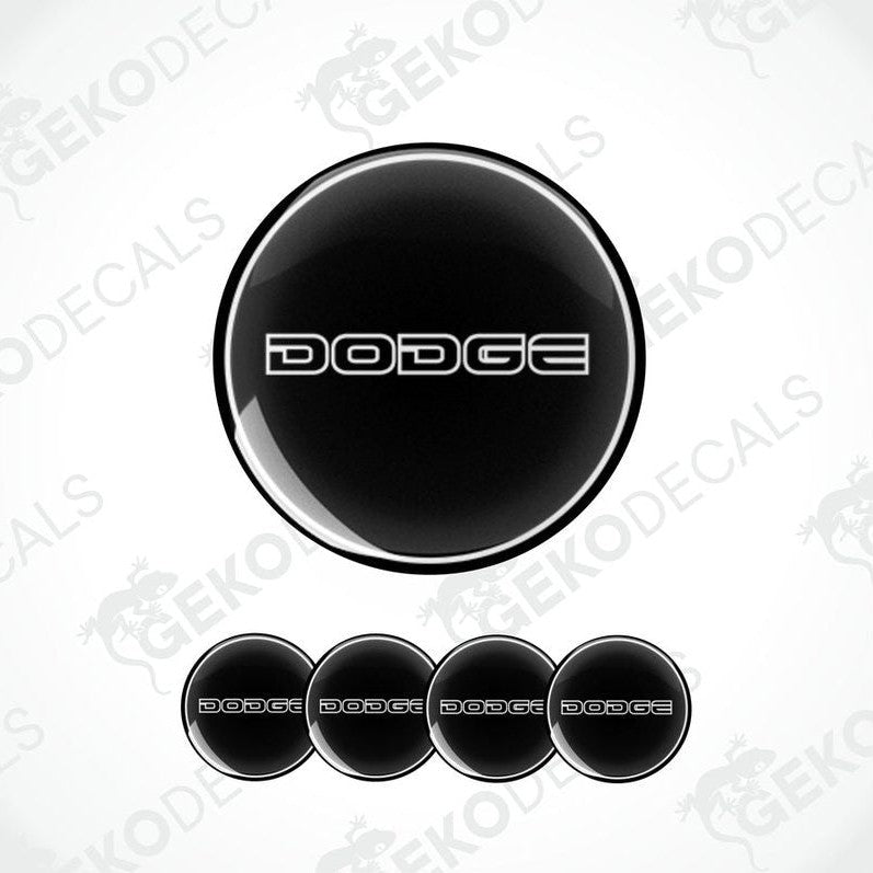 A set of black vinyl decals with the word 'DODGE' written in white letters.