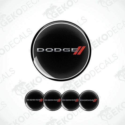 A set of four black vinyl stickers with the word 'DODGE' written in red and white, displayed against a white background.