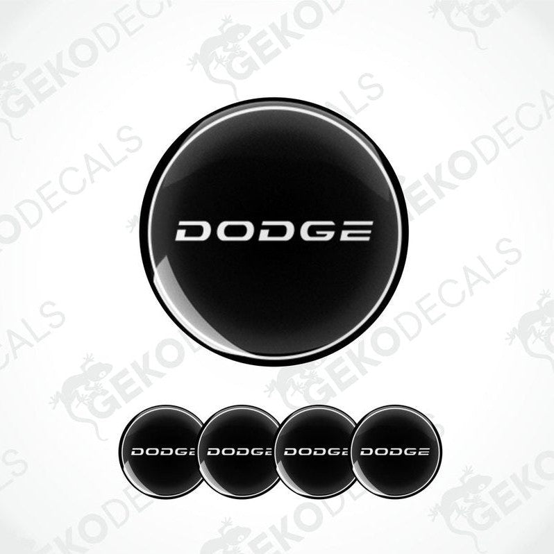 A set of four black vinyl stickers with the word 'DODGE' printed on them, arranged in a circular pattern with a white background.