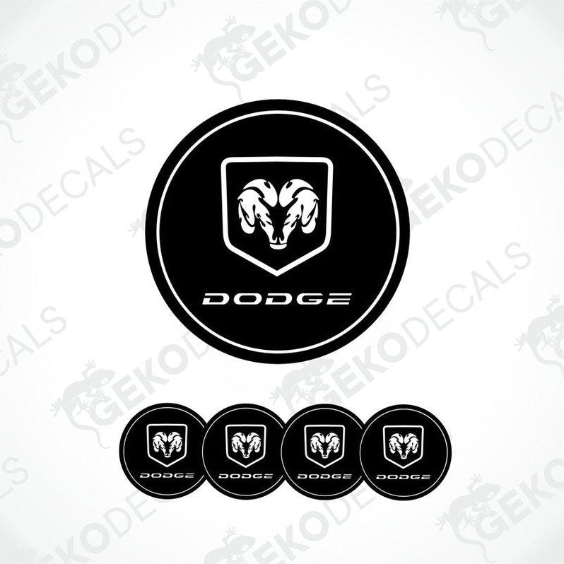 A set of black vinyl decals with a white DODGE ram's head design, intended for use as car wheel decals.