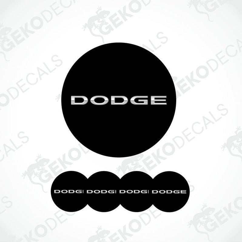 A set of four black vinyl stickers with the word silver metallic 'DODGE'.