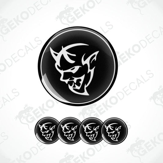 A set of vinyl decals featuring a black and white DODGE demon design, intended for use on vehicles.