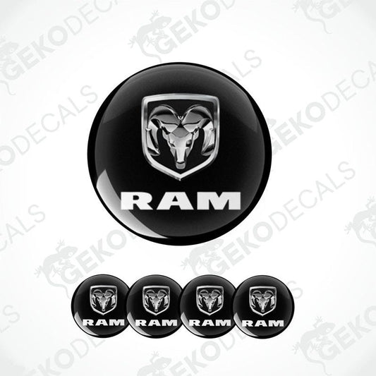 A set of four black vinyl stickers with the word 'RAM' and a ram logo printed on them.