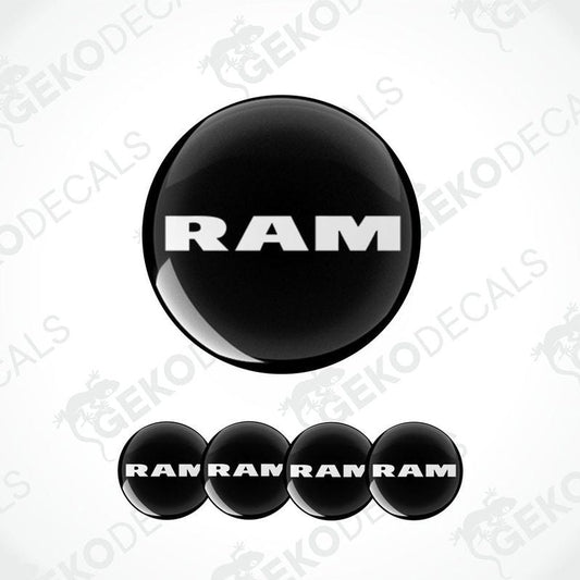 A set of black vinyl decals with the DODGE RAM logo, including four different sizes suitable for car wheels.